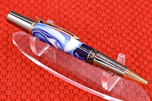 Handmade Compact twist pen. Blue, black, white resin.