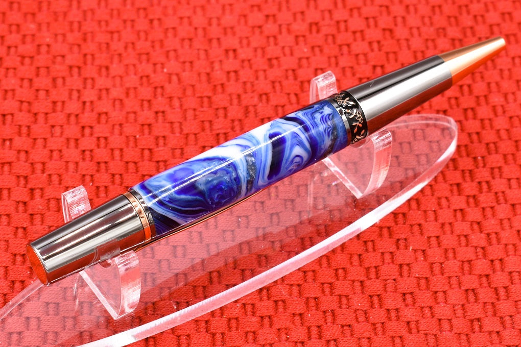 Handmade Compact twist pen. Blue, black, white resin.