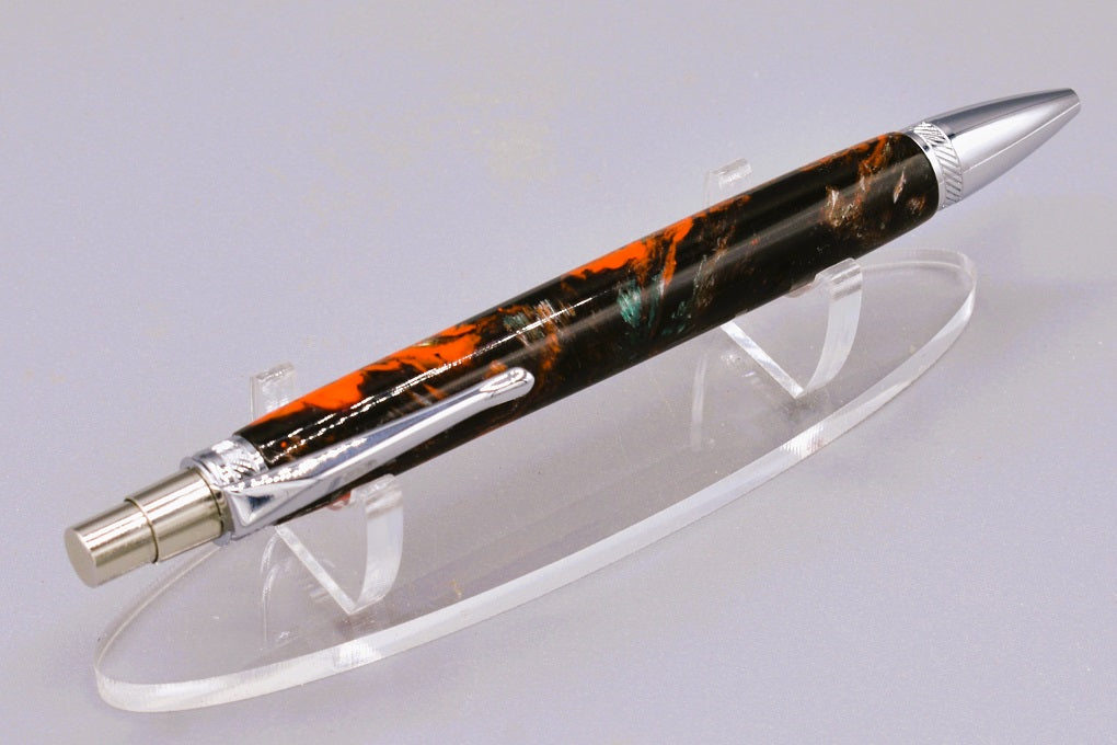 Handmade Thick click pen. Black, orange, silver & teal resin.