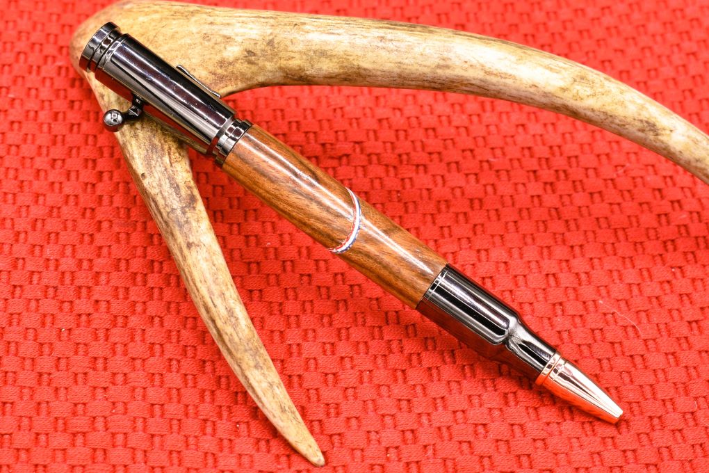Handmade Bolt Action 30 cal. pen. Chechen wood.
