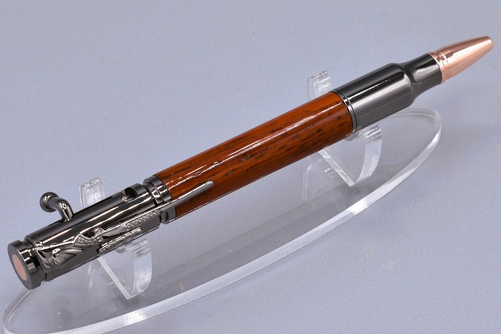 Handmade 30 Cal. Bolt action pen. Padauk wood.
