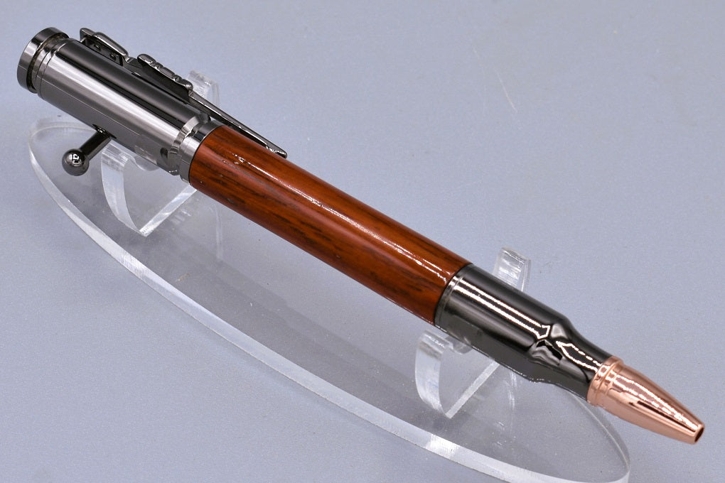 Handmade 30 Cal. Bolt action pen. Padauk wood.