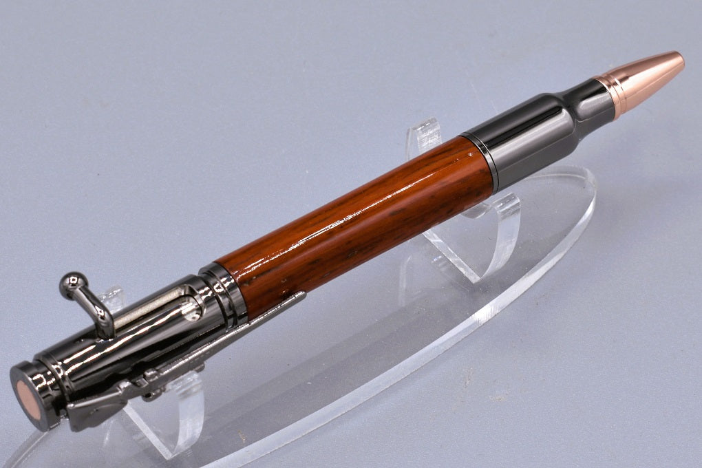 Handmade 30 Cal. Bolt action pen. Padauk wood.