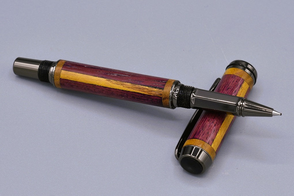 Thick capped rollerball pen. Purpleheart and Mulberry woods.