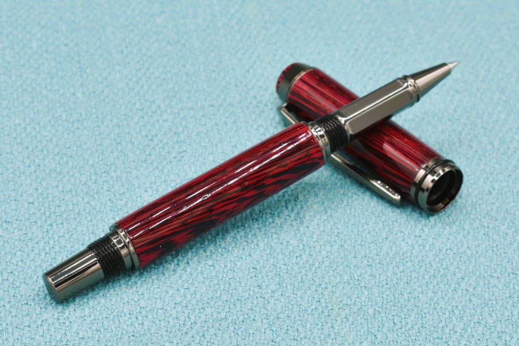 Handmade Thick rollerball pen. Wenge wood dyed red.