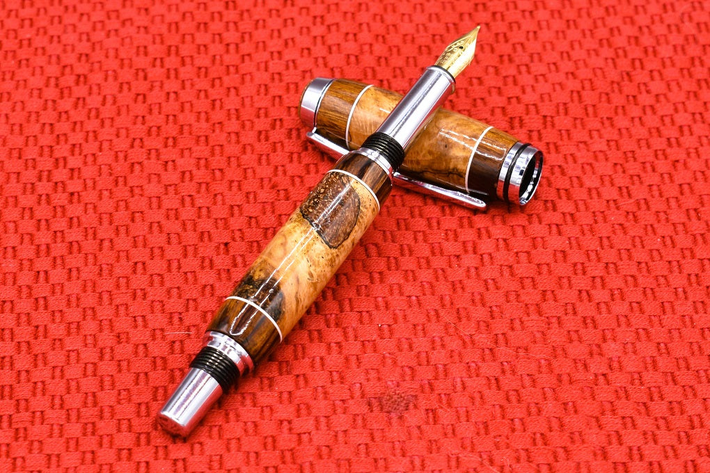 Handmade Thick Fountain pen in Oak Burl and Sonora Desert Ironwood.
