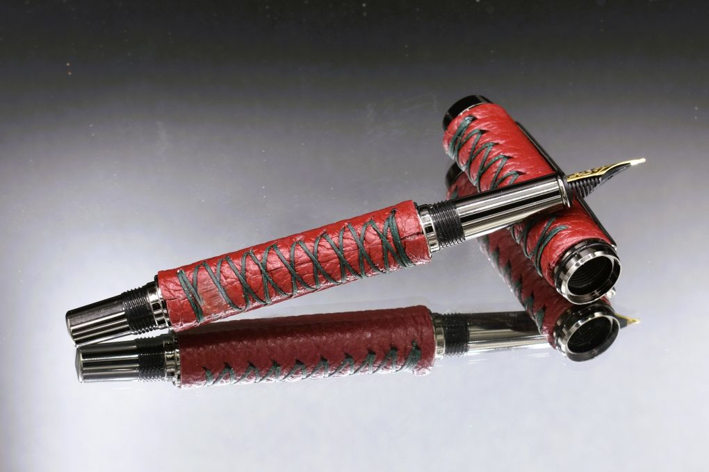 Handmade Thick fountain pen. Cranberry red leather.