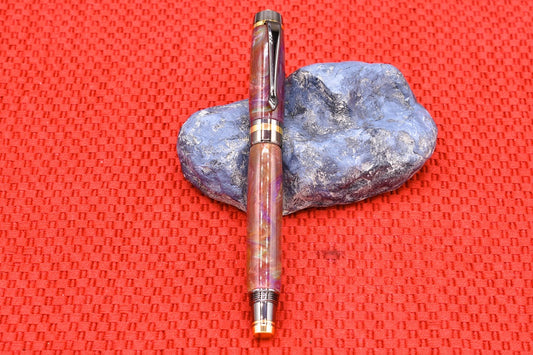 Handmade Classic fountain pen. Red, orange, purple, teal & white resin.