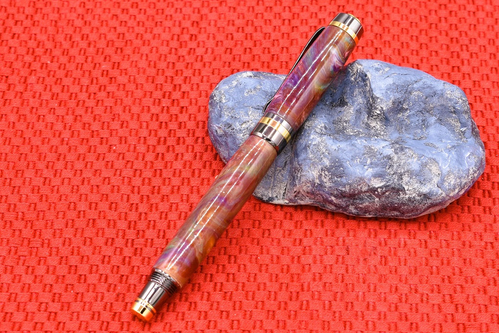 Handmade Classic fountain pen. Red, orange, purple, teal & white resin.