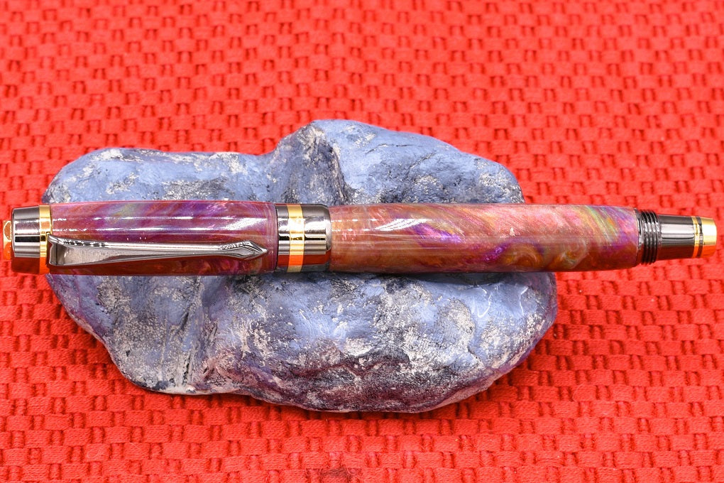Handmade Classic fountain pen. Red, orange, purple, teal & white resin.