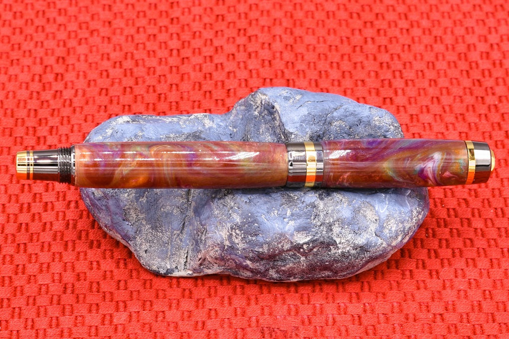 Handmade Classic fountain pen. Red, orange, purple, teal & white resin.