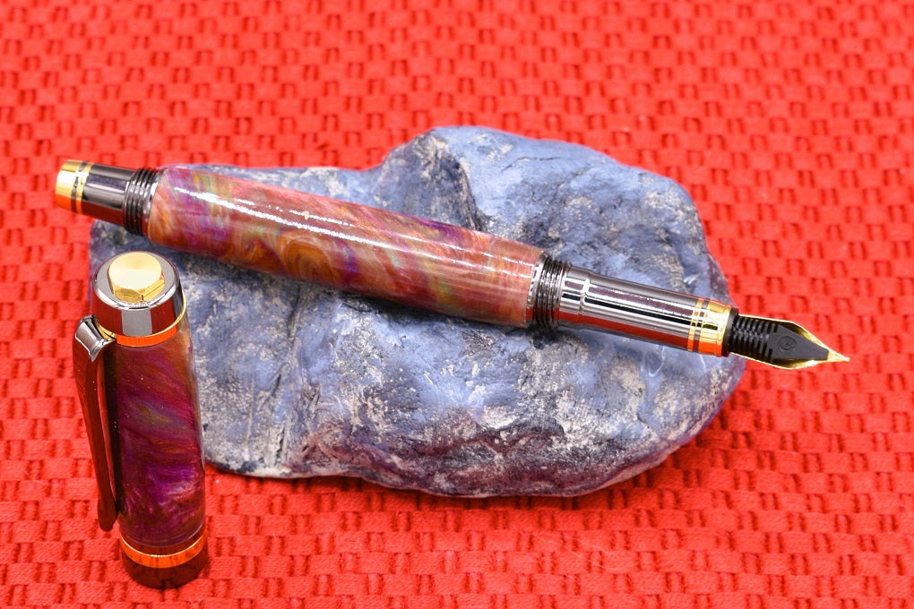 Handmade Classic fountain pen. Red, orange, purple, teal & white resin.