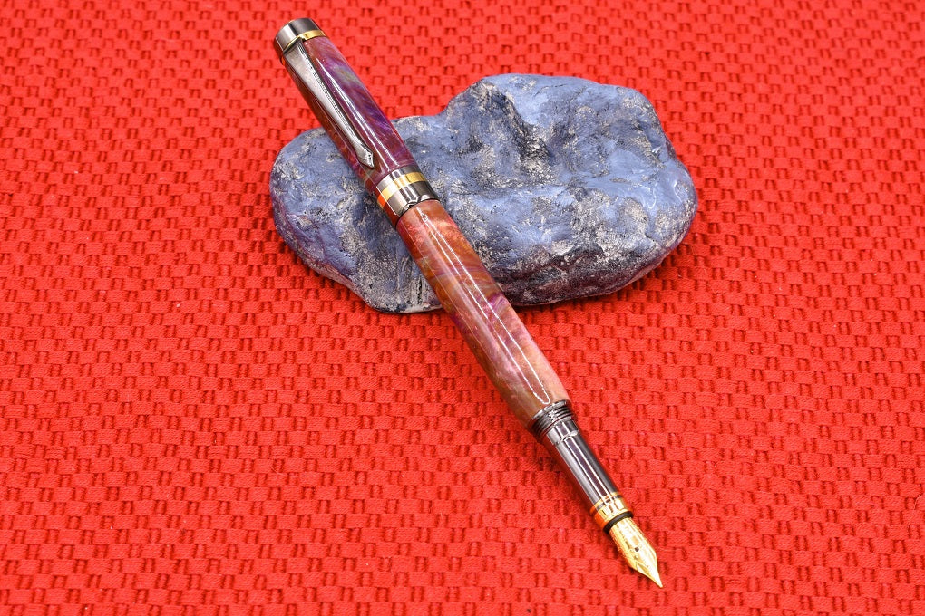 Handmade Classic fountain pen. Red, orange, purple, teal & white resin.