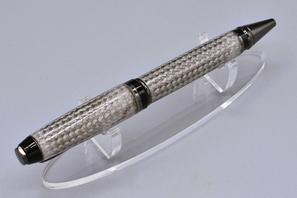 Handmade Cigar twist pen. Resin, braided stainless steel.