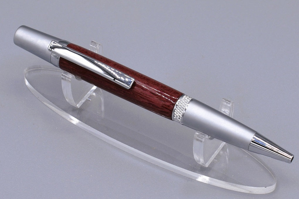 Handmade Knurl twist pen. Purpleheart wood.