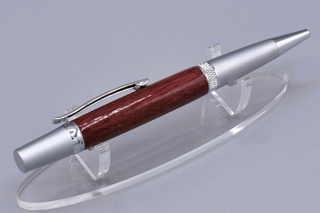 Handmade Knurl twist pen. Purpleheart wood.
