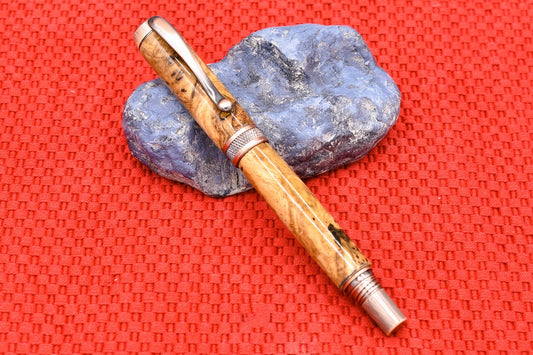 Handmade Knurl Fountain pen in Oak Burl wood.