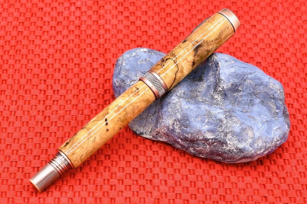 Handmade Knurl Fountain pen in Oak Burl wood.