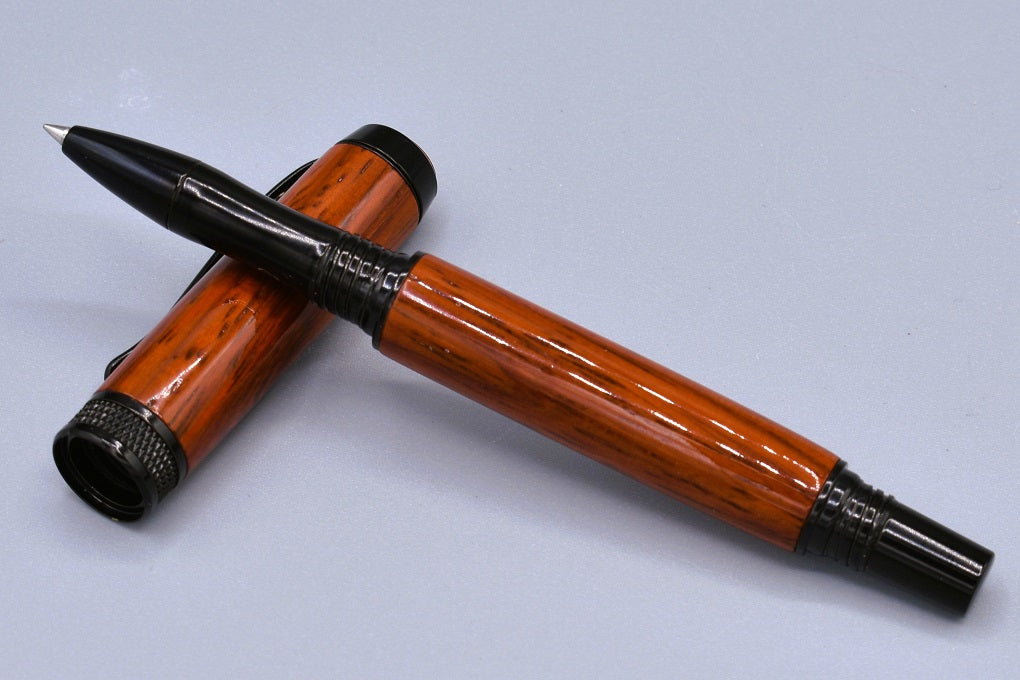 Handmade Knurl rollerball pen. Padauk wood.
