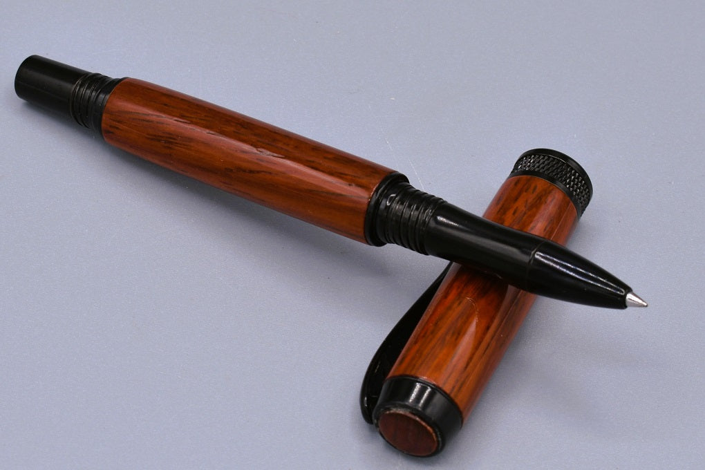 Handmade Knurl rollerball pen. Padauk wood.
