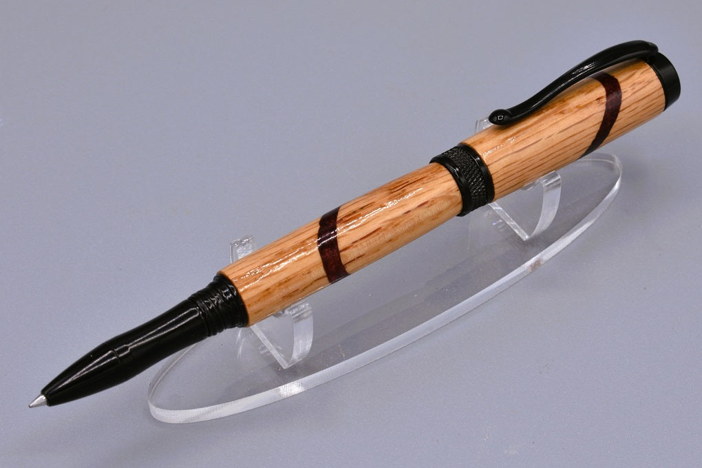 Handmade Knurl rollerball pen. Oak wood and red resin.