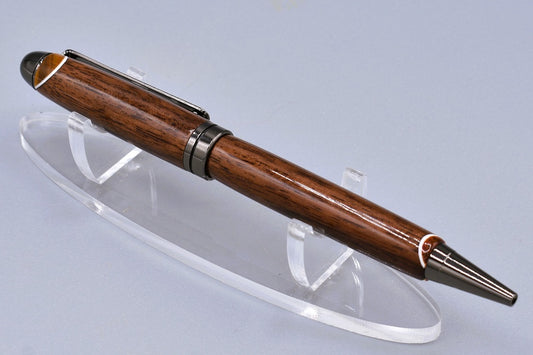 Handmade Round Top twist pen. Walnut, Canary, and Padauk woods.