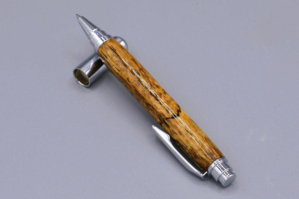 Handmade Chrome capped rollerball pen. Spalted Walnut wood.