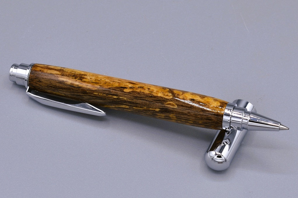 Handmade Chrome capped rollerball pen. Spalted Walnut wood.