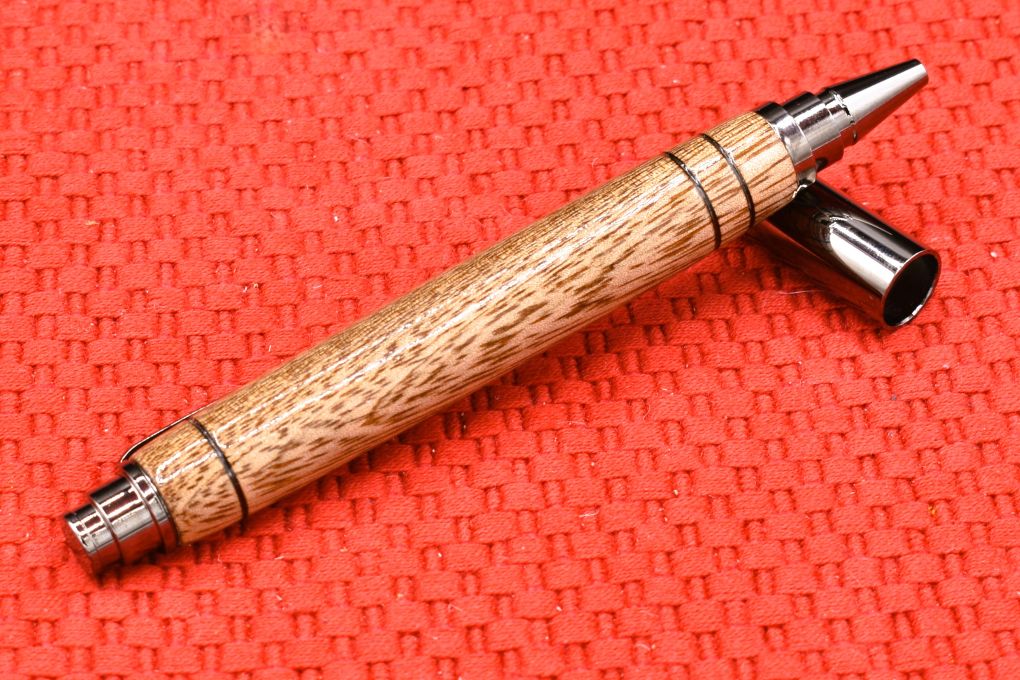 Handmade Click capped rollerball pen. Mango wood.
