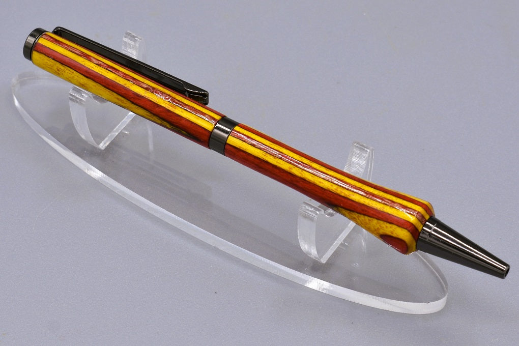 Handmade Slim twist pen. Spectraply wood.