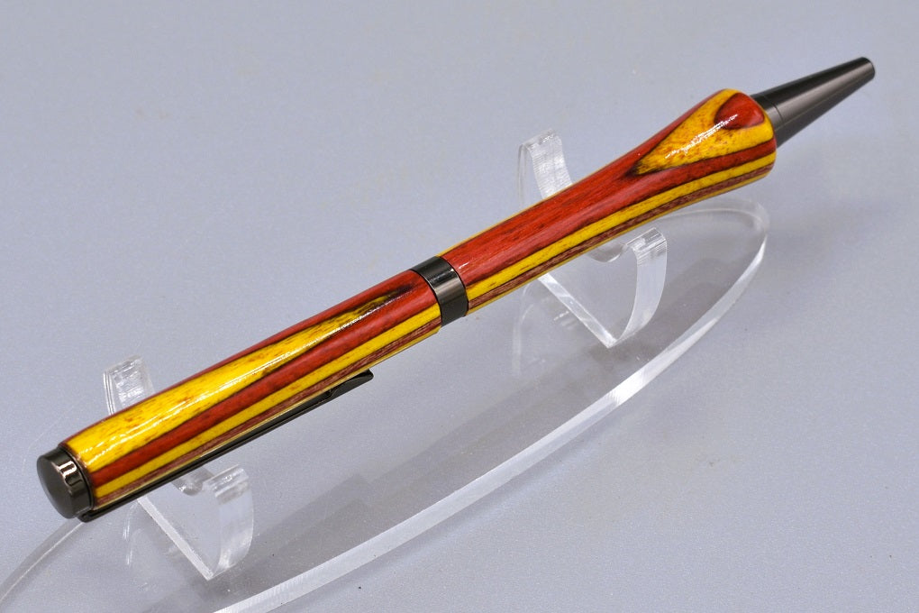 Handmade Slim twist pen. Spectraply wood.
