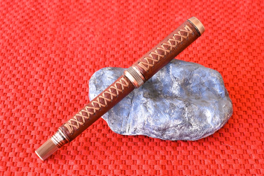 Handmade Leather wrapped Knurl rollerball pen.