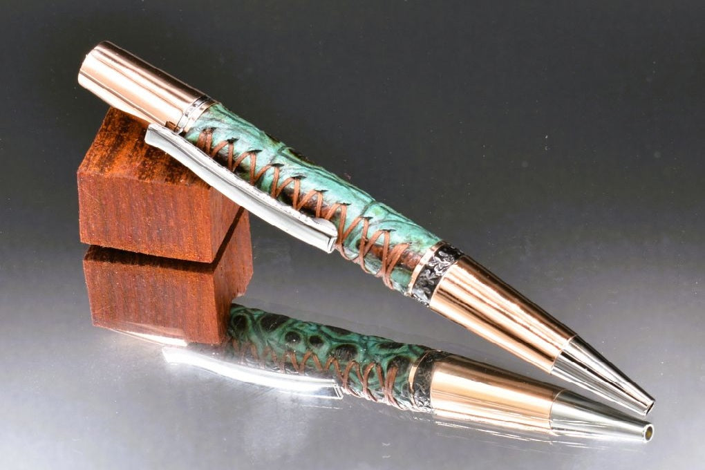 Handmade Compact twist pen. Wrapped in gator embossed turquoise & copper leather.