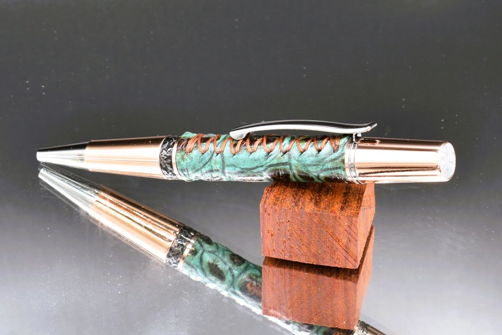 Handmade Compact twist pen. Wrapped in gator embossed turquoise & copper leather.