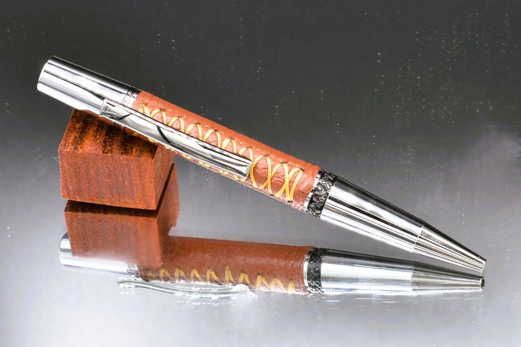 Handmade Compact twist pen. Saddle brown leather.