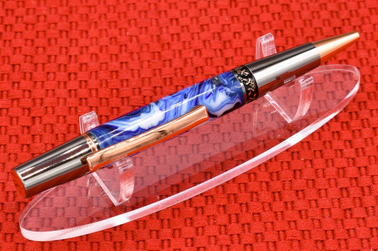 Handmade Compact twist pen. Blue, black, white resin.