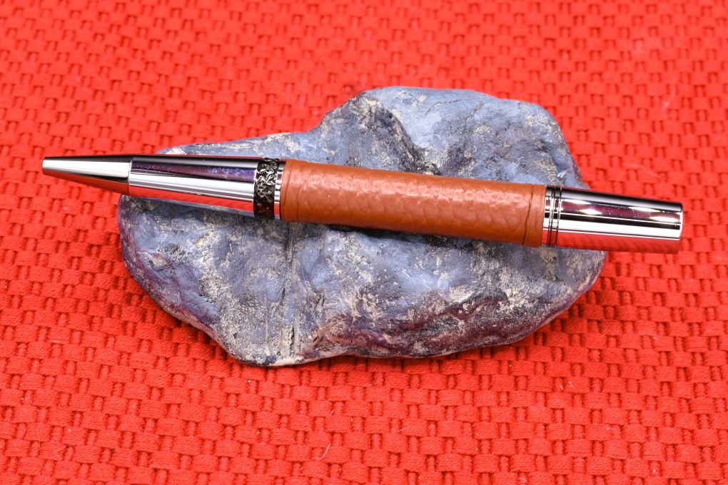 Handmade Compact twist pen. Saddle brown leather.