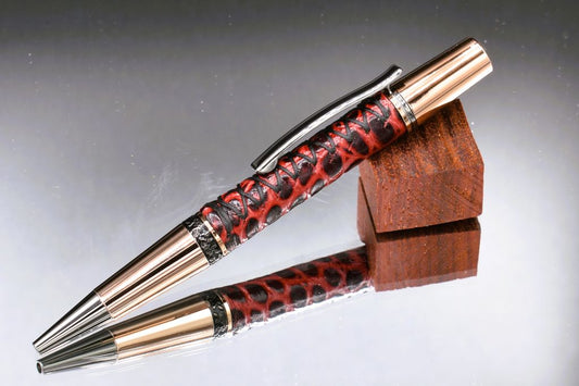 Handmade Compact twist pen. Wrapped in gator embossed Bordeaux leather.