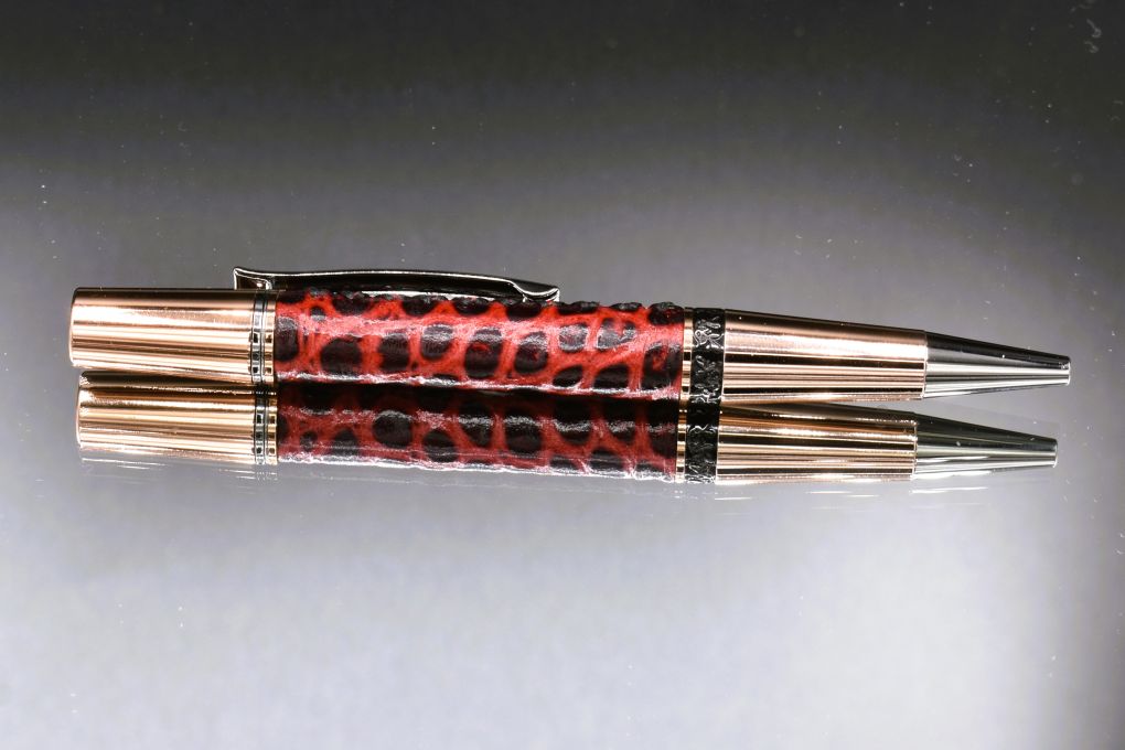 Handmade Compact twist pen. Wrapped in gator embossed Bordeaux leather.