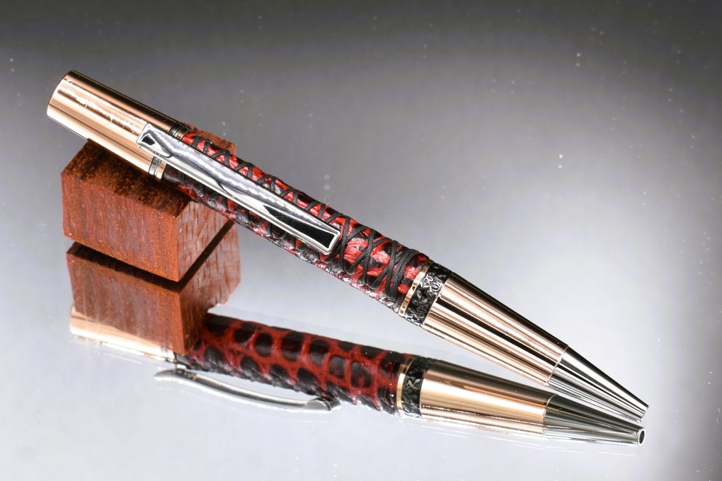 Handmade Compact twist pen. Wrapped in gator embossed Bordeaux leather.