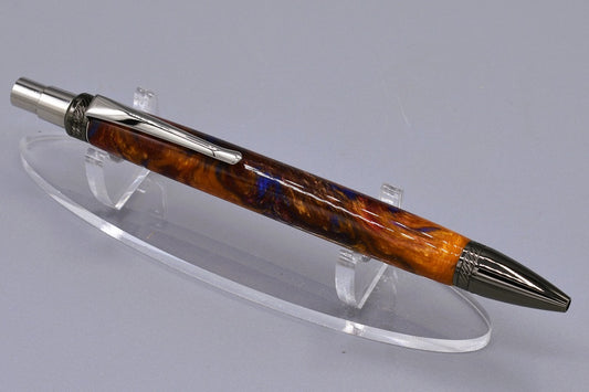 Handmade thick click pen. Blue, red, Aztec gold resin.