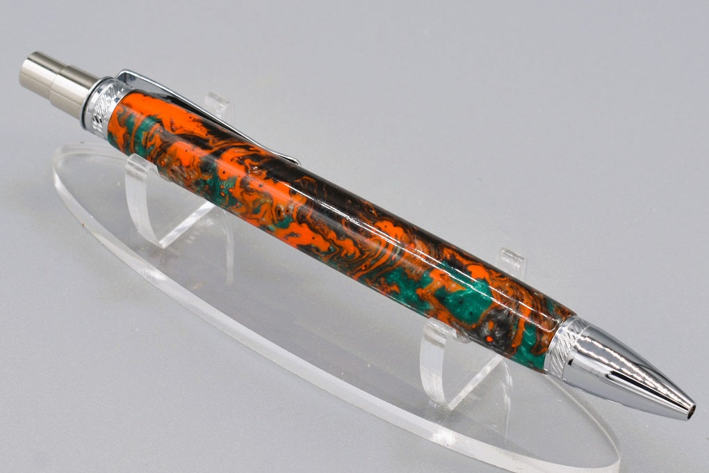 Handmade Thick click pen. Black, orange, silver & teal resin.