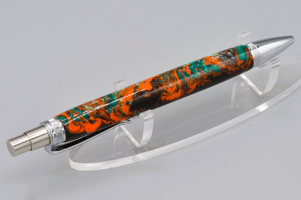 Handmade Thick click pen. Black, orange, silver & teal resin.