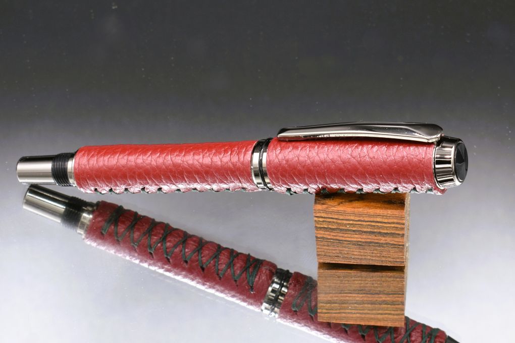 Handmade Thick fountain pen. Cranberry red leather.