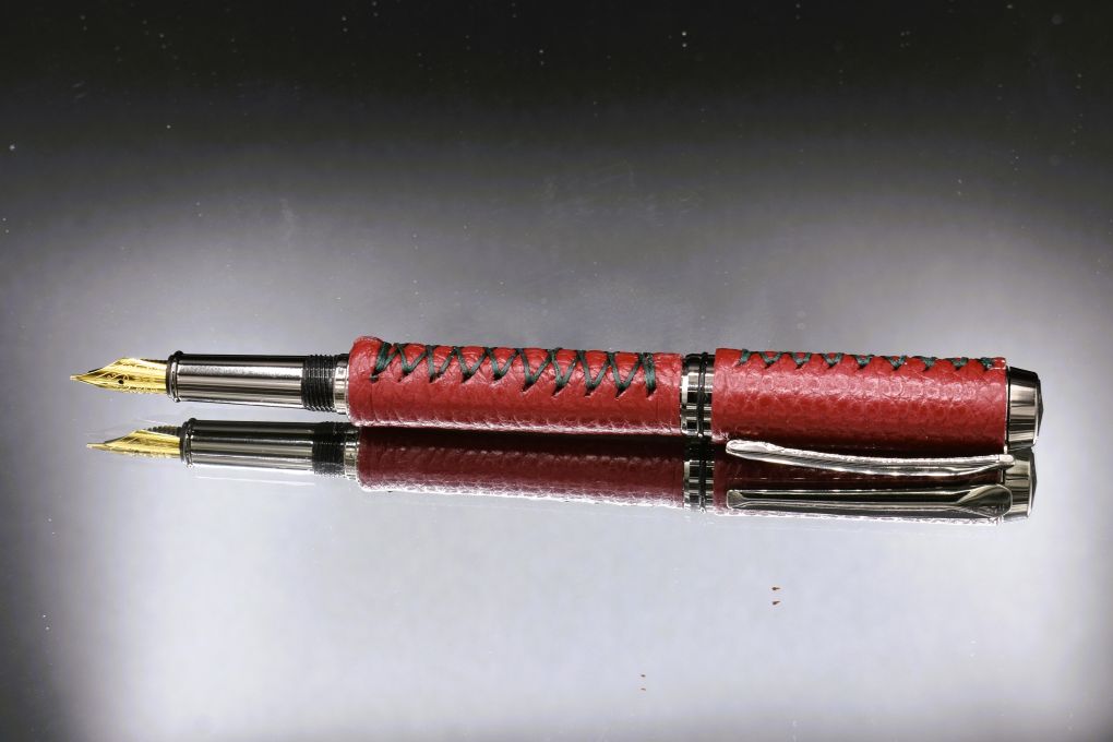 Handmade Thick fountain pen. Cranberry red leather.