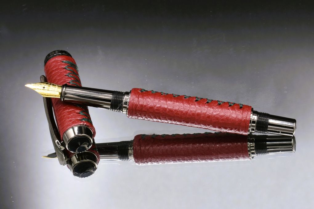 Handmade Thick fountain pen. Cranberry red leather.