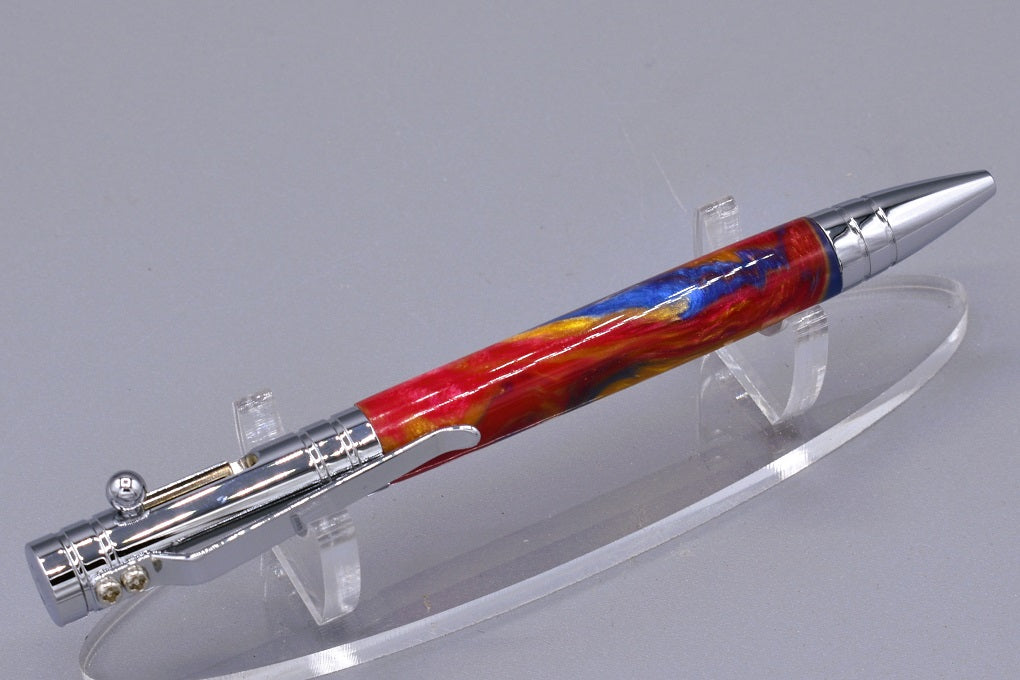 Handmade Bolt Action click pen. Blue, red, gold resin.