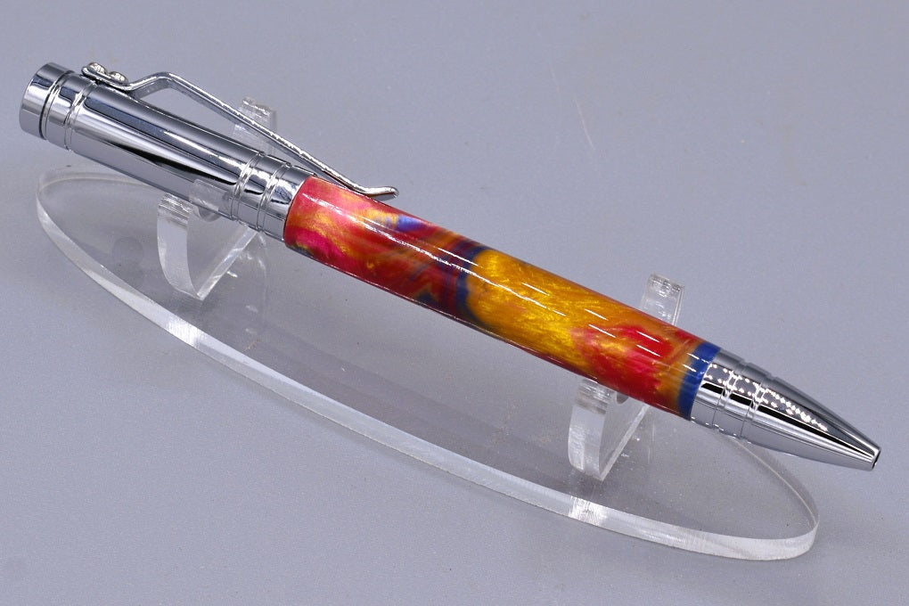 Handmade Bolt Action click pen. Blue, red, gold resin.