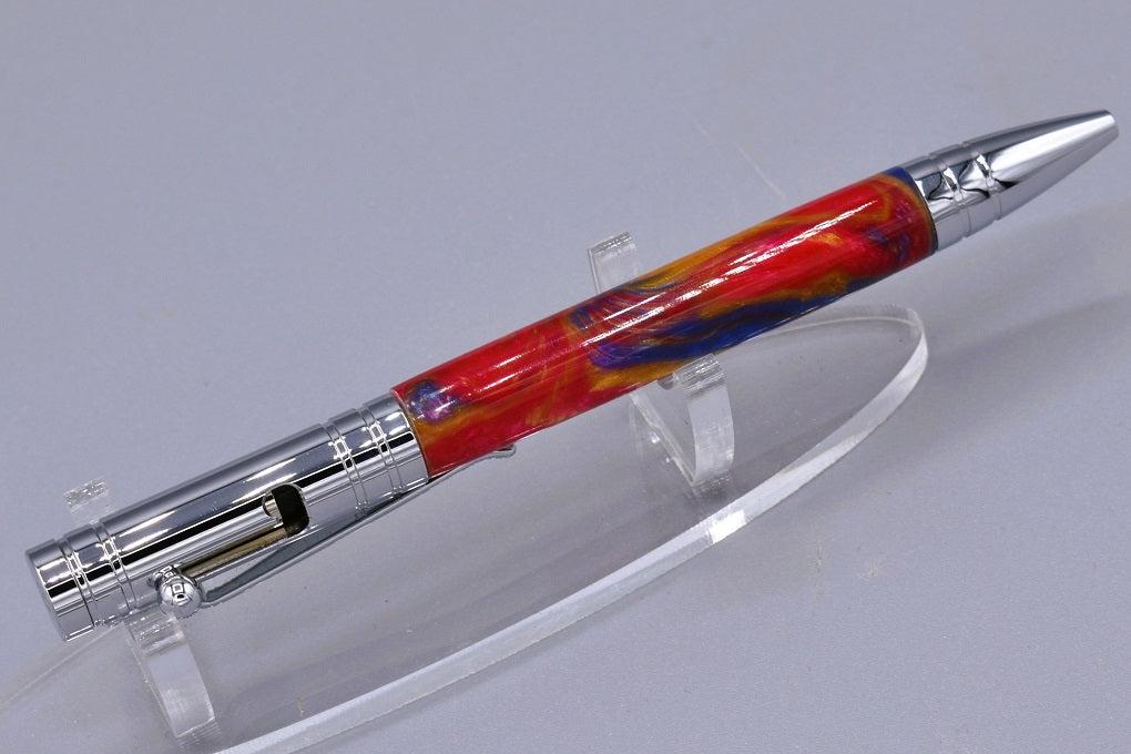 Handmade Bolt Action click pen. Blue, red, gold resin.