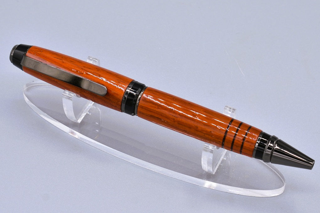 Handmade Cigar twist pen. Padauk wood.